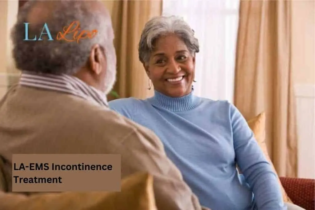 Couple sat smiling at each other - LA-EMS treatment Greater London (Barnet)